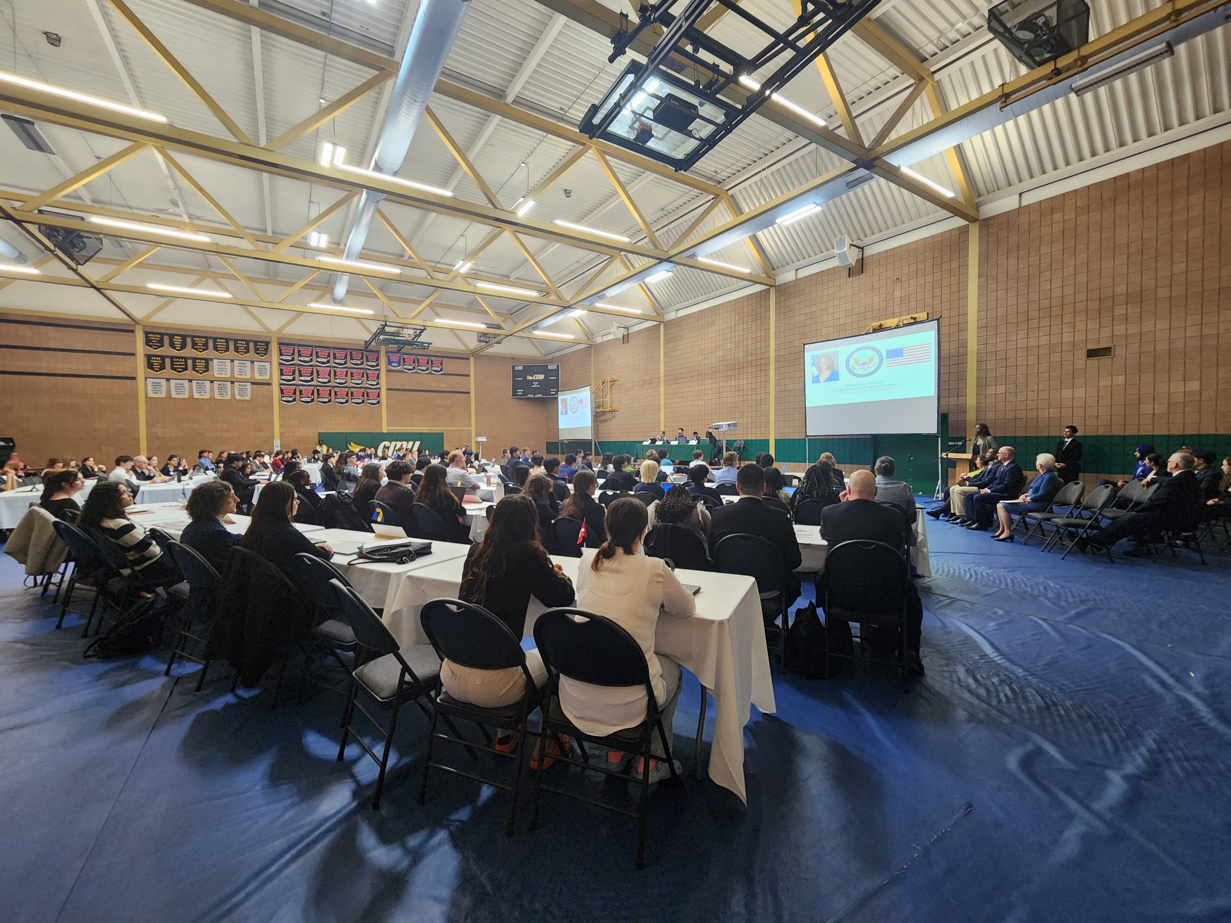 Delegates seated in a Model United Nations assembly